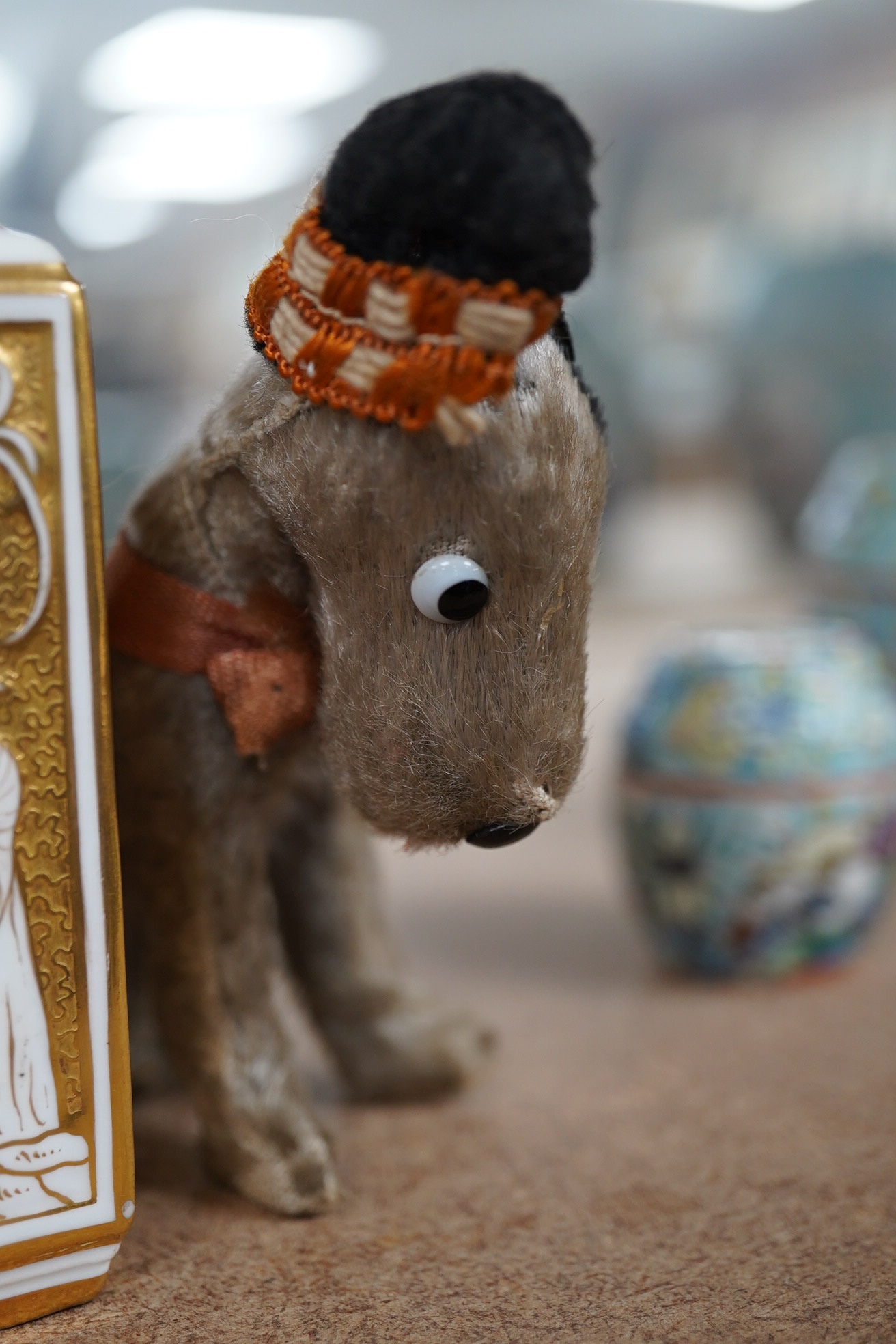 A Continental porcelain scent bottle, a small Japanese Satsuma pottery vase and a vintage soft toy Scottie dog, largest 11cm high. Condition - fair, vase neck restored